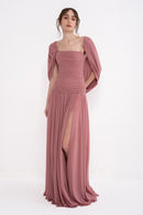 Elegant VITA dress by MANEL-FASHION featuring a stylish design and comfortable fit, showcased on a model.