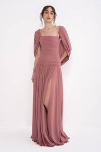 Elegant VITA dress by MANEL-FASHION featuring a stylish design and comfortable fit, showcased on a model.
