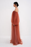 Manel-Fashion Hestia dress in soft fabric with a stylish neckline and elegant fit, perfect for casual or semi-formal occasions.