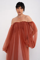 Manel-Fashion Hestia Dress in flowing fabric with a stylish design, perfect for casual or semi-formal occasions.