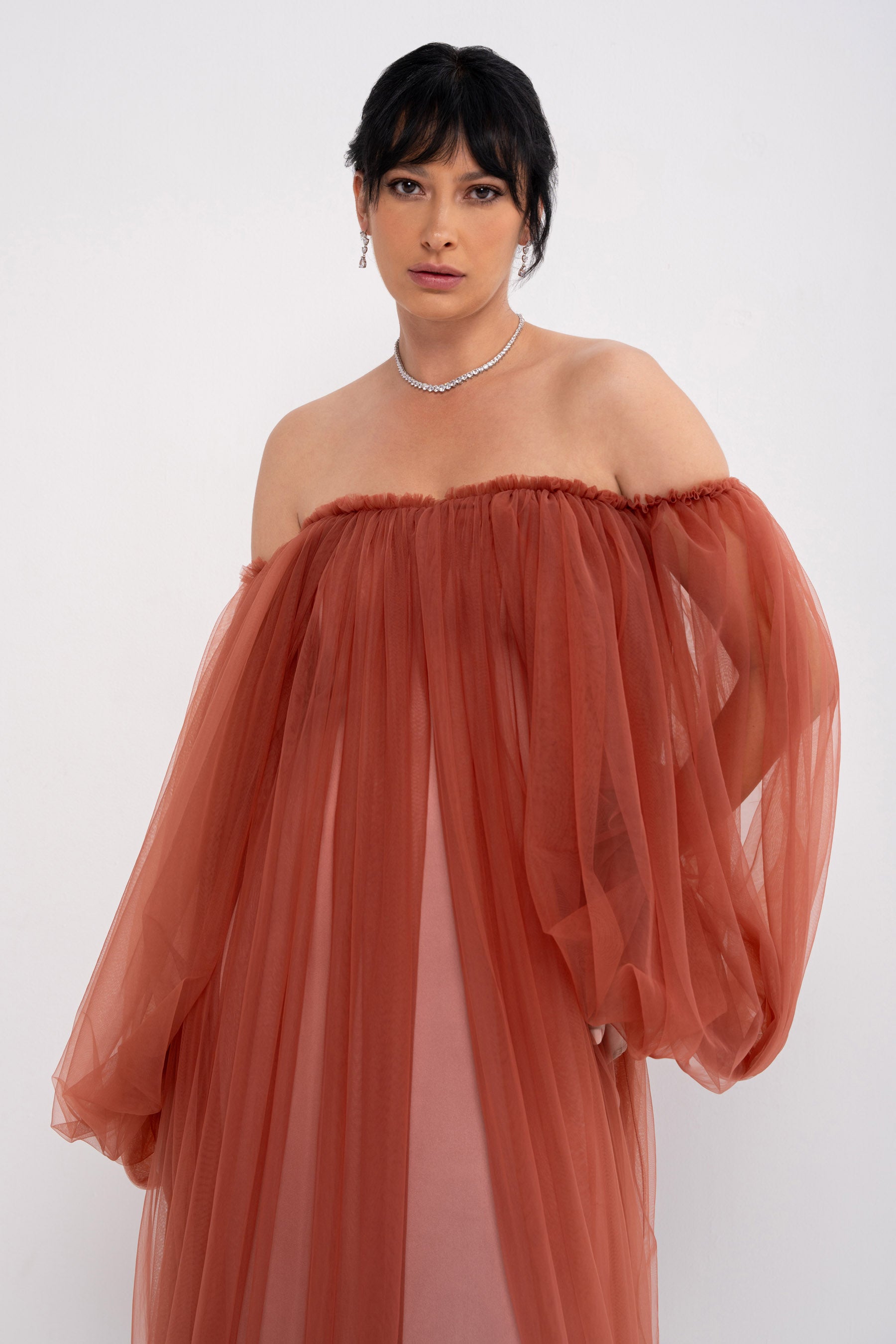Manel-Fashion Hestia Dress in flowing fabric with a stylish design, perfect for casual or semi-formal occasions.
