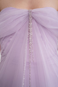 Anthea dress by Manel-Fashion featuring a stylish, elegant design with flowing fabric and intricate details.