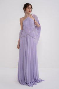 Manel-Fashion Hera dress displayed on a hanger, featuring a stylish, elegant design in soft fabric with intricate detailing.
