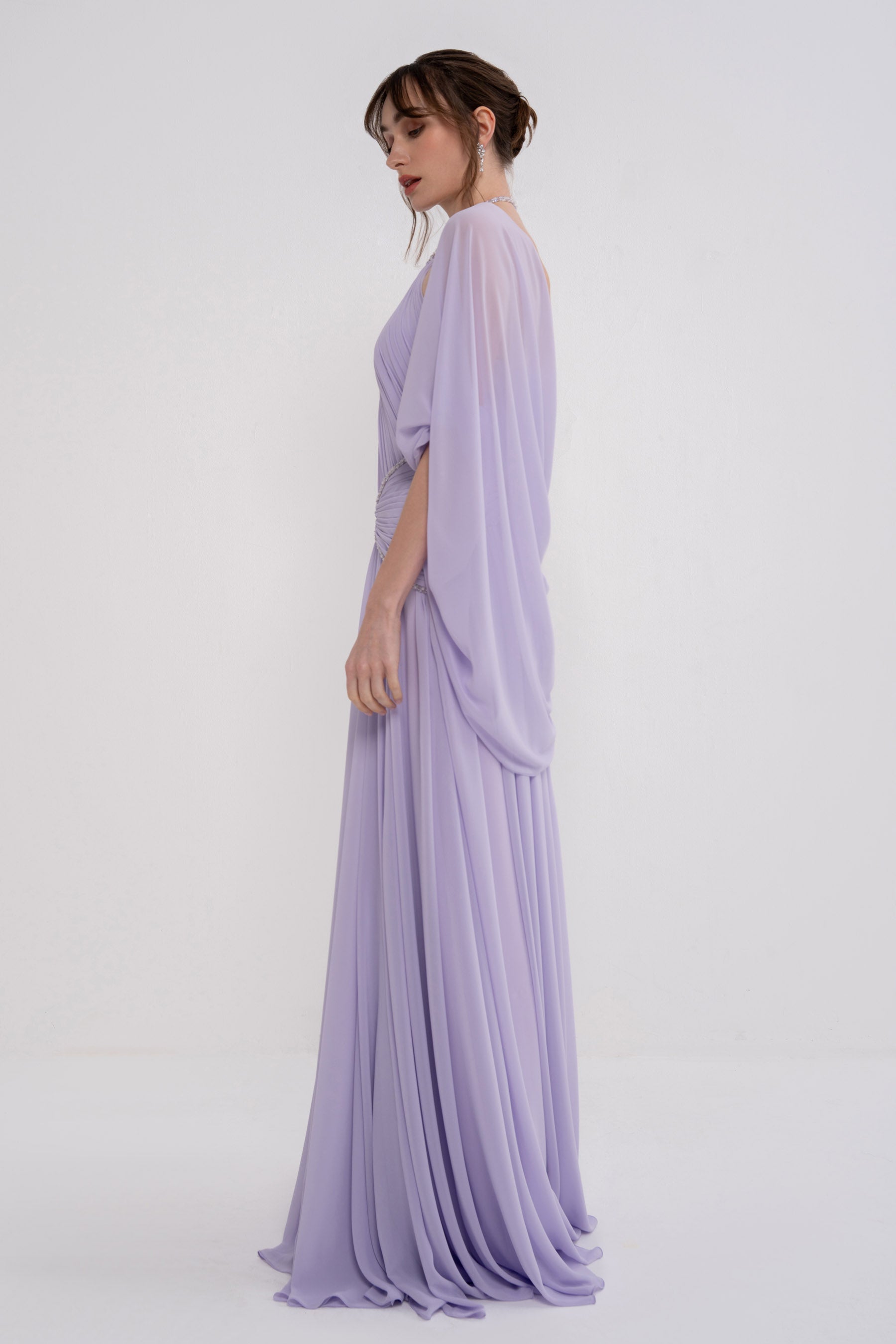 Elegant HERA dress by MANEL-FASHION featuring a stylish silhouette and intricate detailing, perfect for formal occasions.