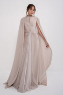 Elegant GLORY dress by MANEL-FASHION featuring a stylish design, perfect for formal occasions, shown on a model.