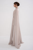 Manel-Fashion Glory Dress displayed on a hanger, featuring a stylish, elegant design suitable for formal or casual occasions.
