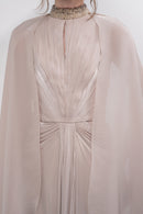 Elegant Glory Dress by Manel-Fashion featuring a flowing design and stylish details, perfect for formal occasions.