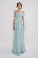 Manel-Fashion Gaia dress in lightweight fabric, featuring a flowing silhouette and elegant design for casual or semi-formal wear.