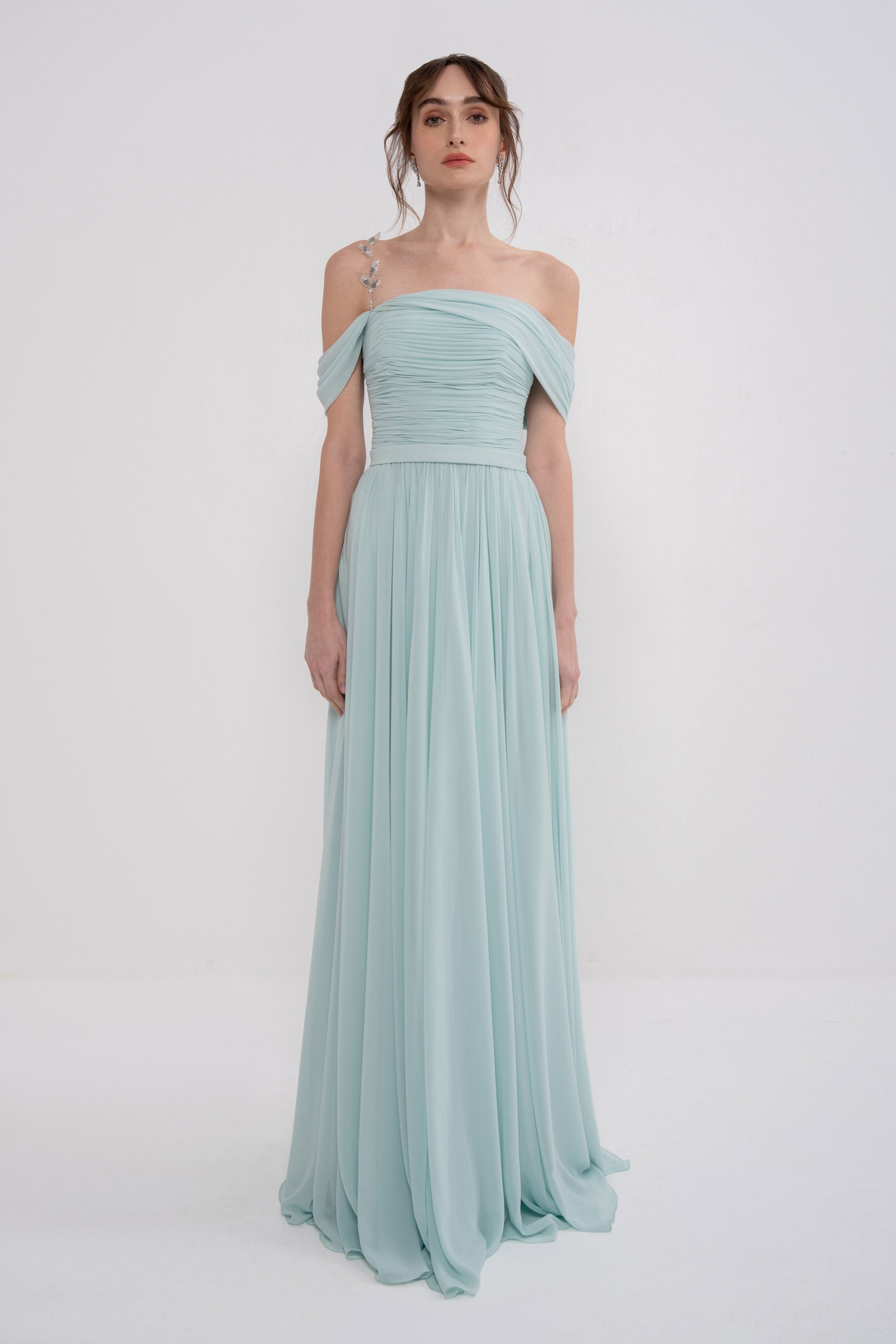 Manel-Fashion Gaia dress in lightweight fabric, featuring a flowing silhouette and elegant design for casual or semi-formal wear.