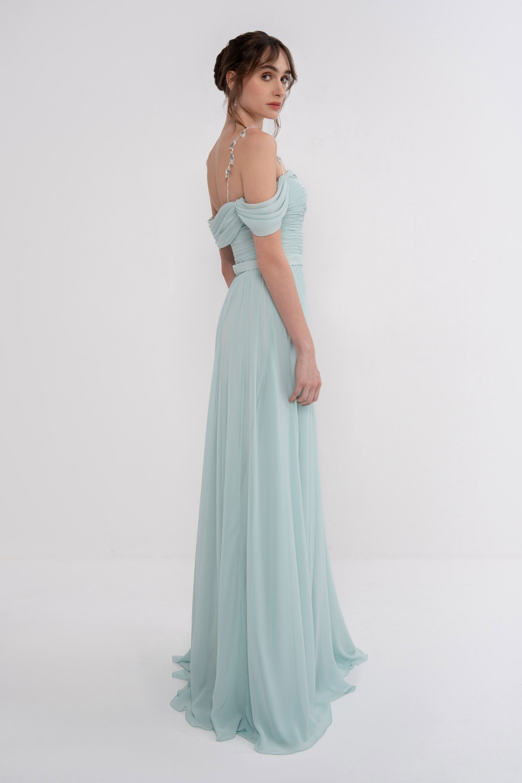 Manel-Fashion Gaia dress shown on a model, featuring a stylish, flowing design in a vibrant color, perfect for casual or dressy occasions.