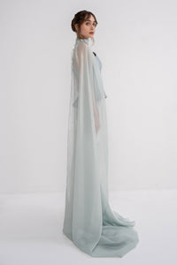 Manel-Fashion Astra set featuring stylish clothing and accessories displayed on a mannequin.