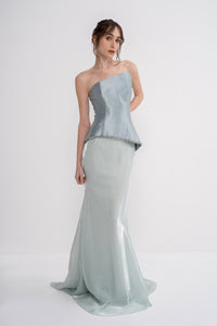 Manel-Fashion Astra set featuring stylish clothing and accessories, displayed in a well-lit fashion display.