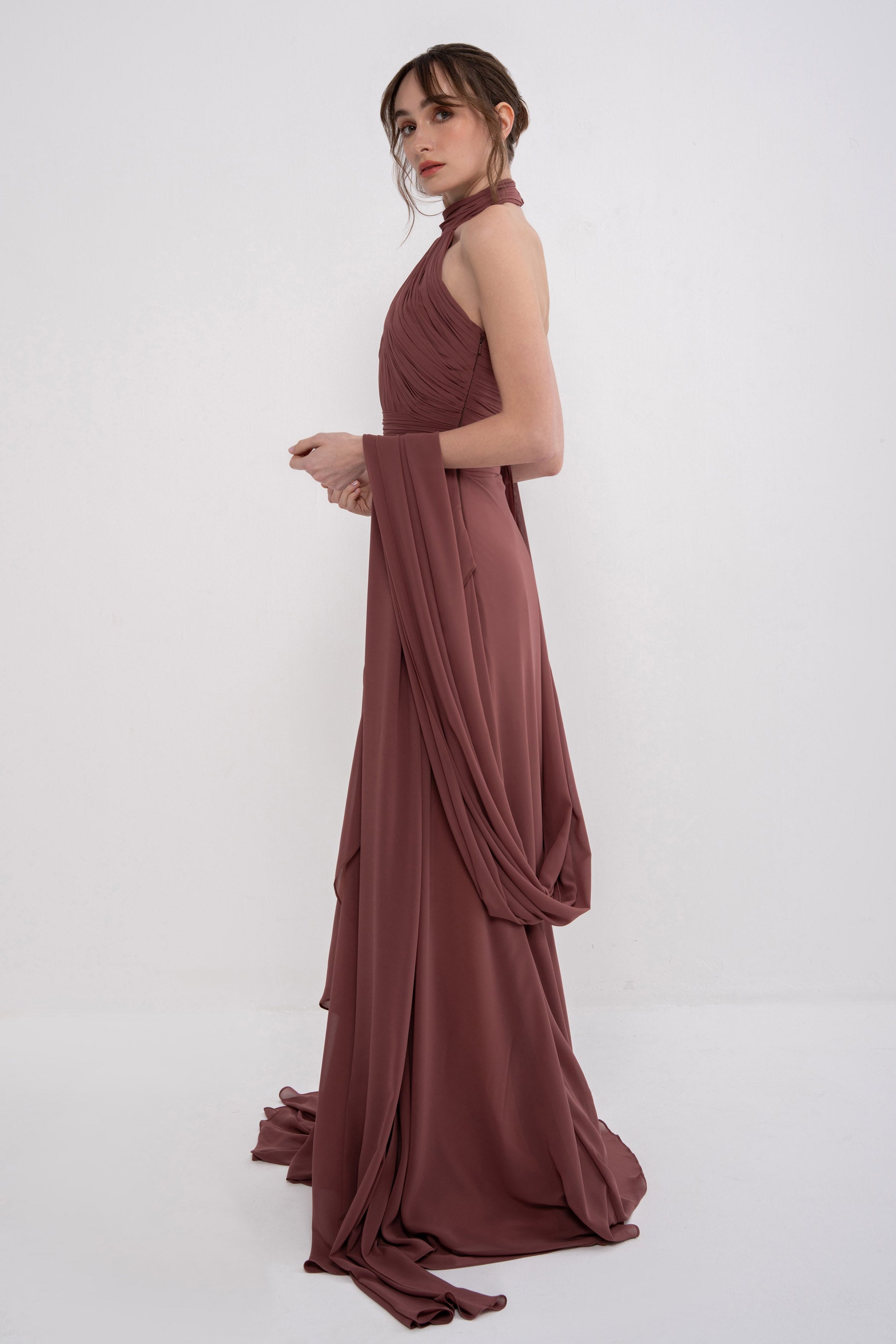 Elegant AETHER dress by MANEL-FASHION featuring a flowing design and stylish silhouette.