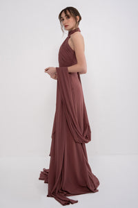 Elegant AETHER dress by MANEL-FASHION featuring a flowing design and stylish silhouette.