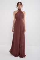 Elegant AETHER dress by MANEL-FASHION featuring stylish design and flowy fabric, perfect for casual or formal occasions.