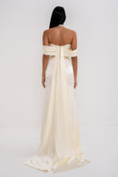 Manel-Fashion Grazia dress in a stylish design, displayed on a hanger with fabric details visible.