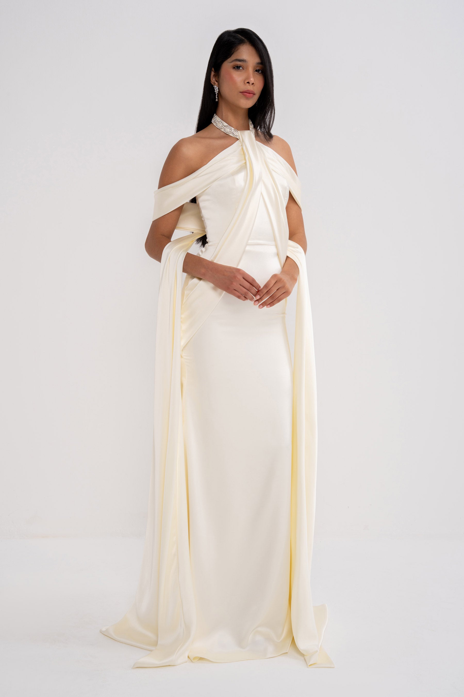 Manel-Fashion Grazia dress displayed on a hanger, featuring a stylish, flowy fabric and elegant design for women.