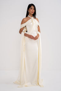 Manel-Fashion Grazia dress displayed on a hanger, featuring a stylish, flowy fabric and elegant design for women.
