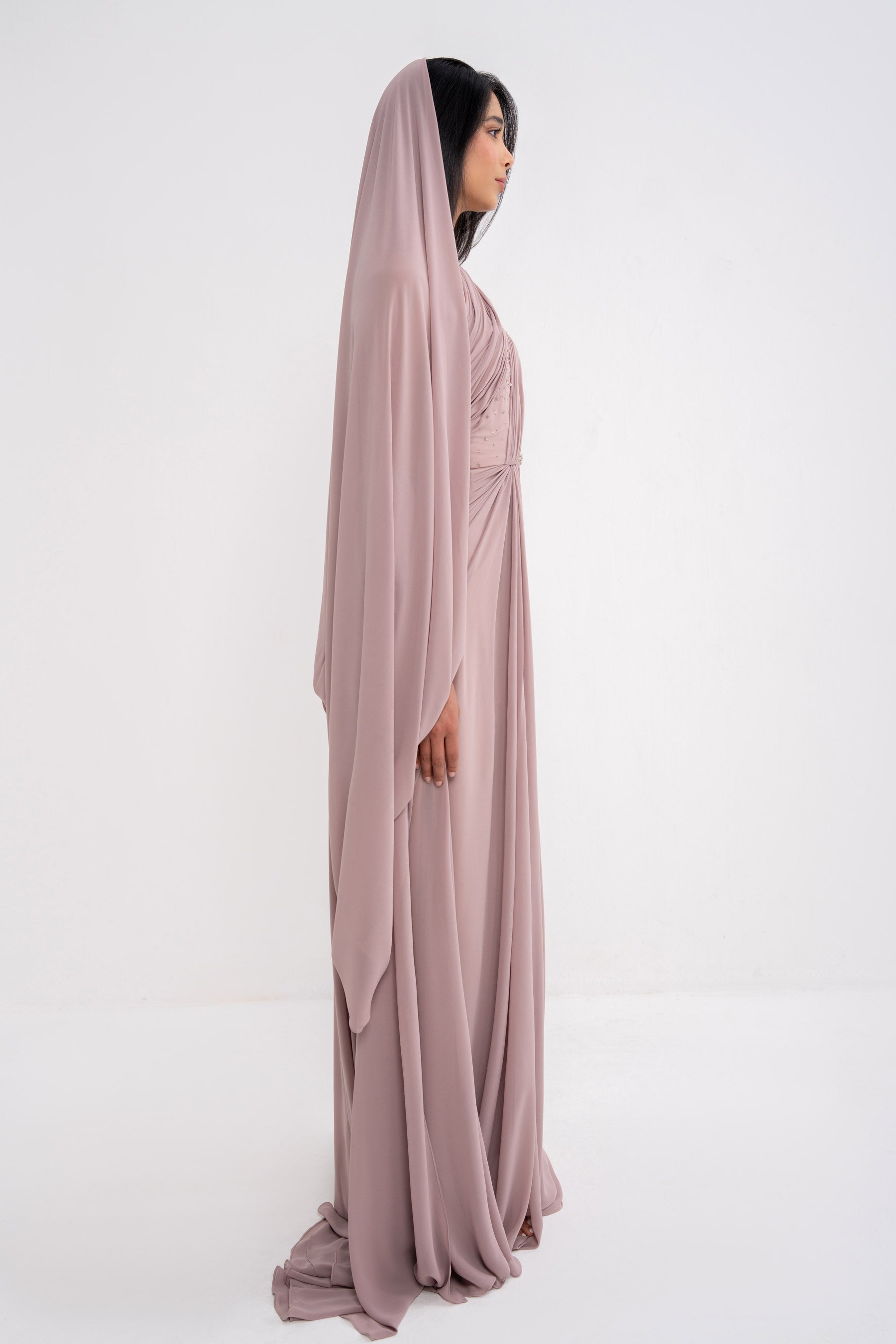 Elegant MYTH DRESS by MANEL-FASHION, featuring a stylish design and flowing fabric, suitable for formal or casual occasions.
