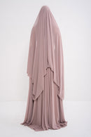 Manel-Fashion Myth Dress featuring a stylish, elegant design with flowing fabric and intricate detailing.
