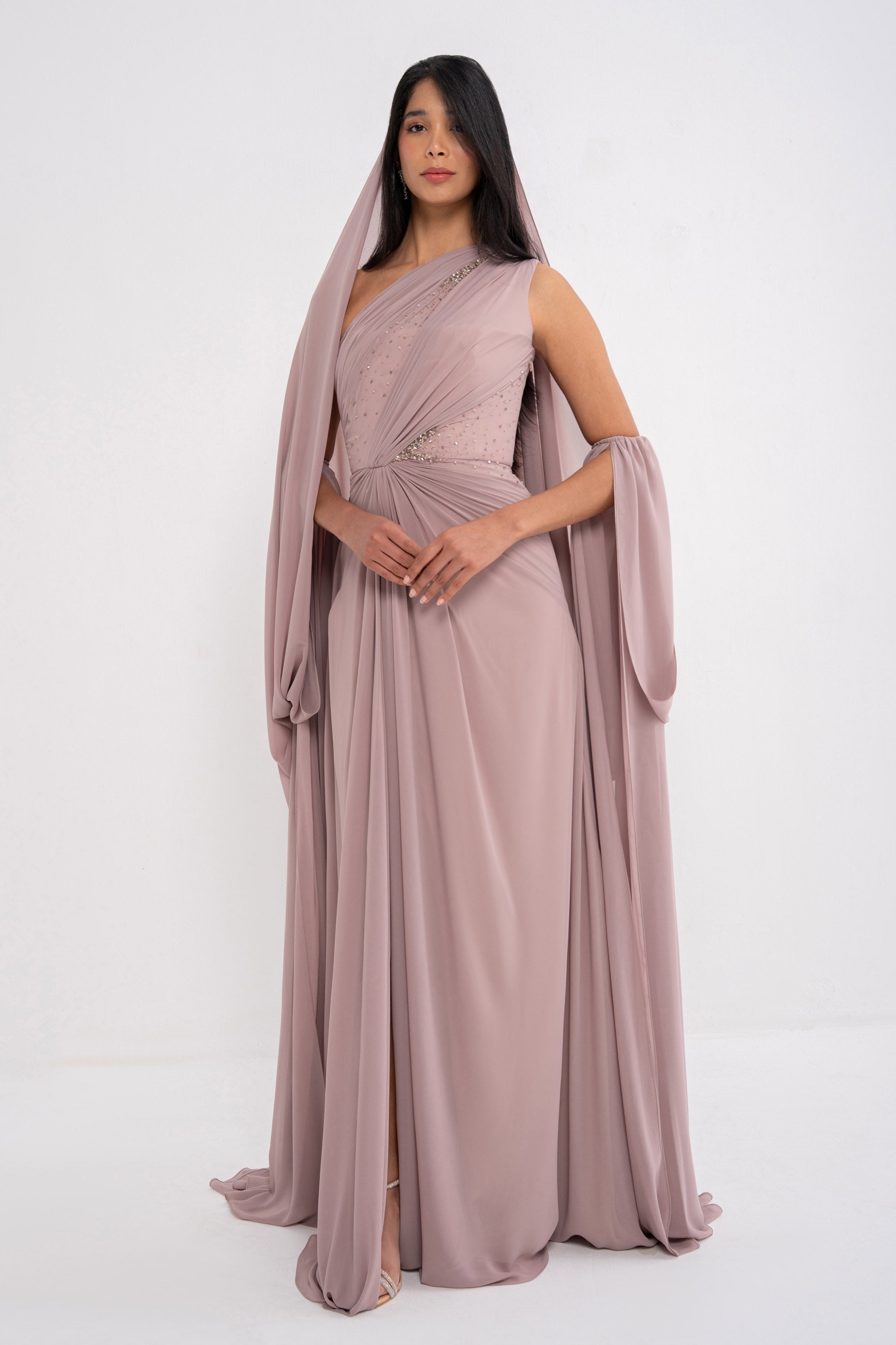 Manel-Fashion Myth Dress featuring a stylish, elegant design with flowing fabric and intricate detailing.