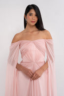 Elegant Aphrodite dress by Manel-Fashion featuring flowing fabric and intricate design, perfect for stylish occasions.