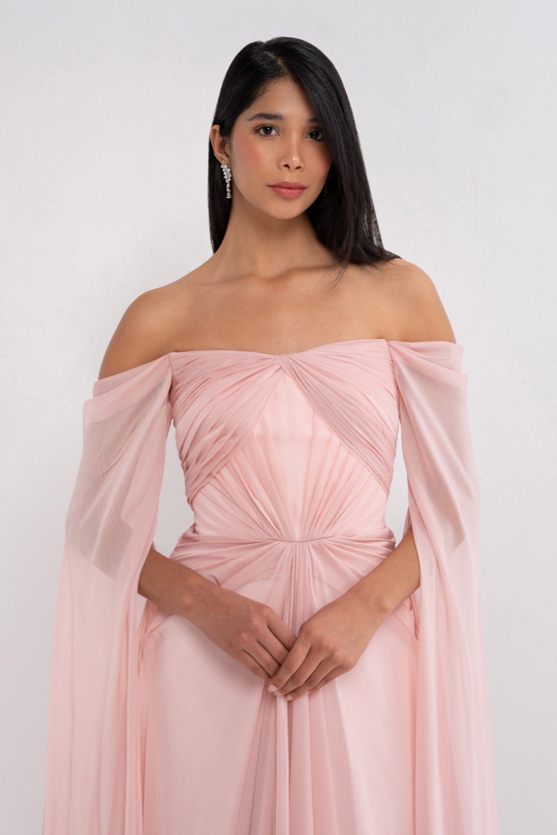 Elegant Aphrodite dress by Manel-Fashion featuring flowing fabric and intricate design, perfect for stylish occasions.