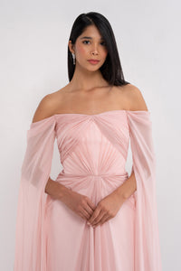 Elegant Aphrodite dress by Manel-Fashion featuring flowing fabric and intricate design, perfect for stylish occasions.