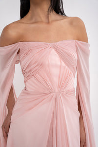 Elegant Aphrodite dress by Manel-Fashion featuring flowing fabric and intricate design, perfect for stylish occasions.
