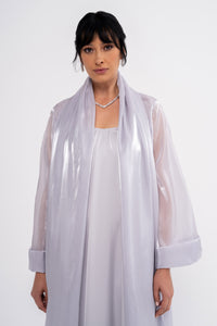Manel-Fashion CLEA grey dress displayed on a hanger with a simple background, showcasing the stylish, casual women's clothing.