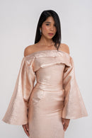 Manel-Fashion Juno set featuring a stylish, modern outfit with matching top and bottom in neutral tones.