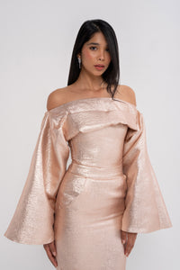 Manel-Fashion Juno set featuring a stylish, modern outfit with matching top and bottom in neutral tones.