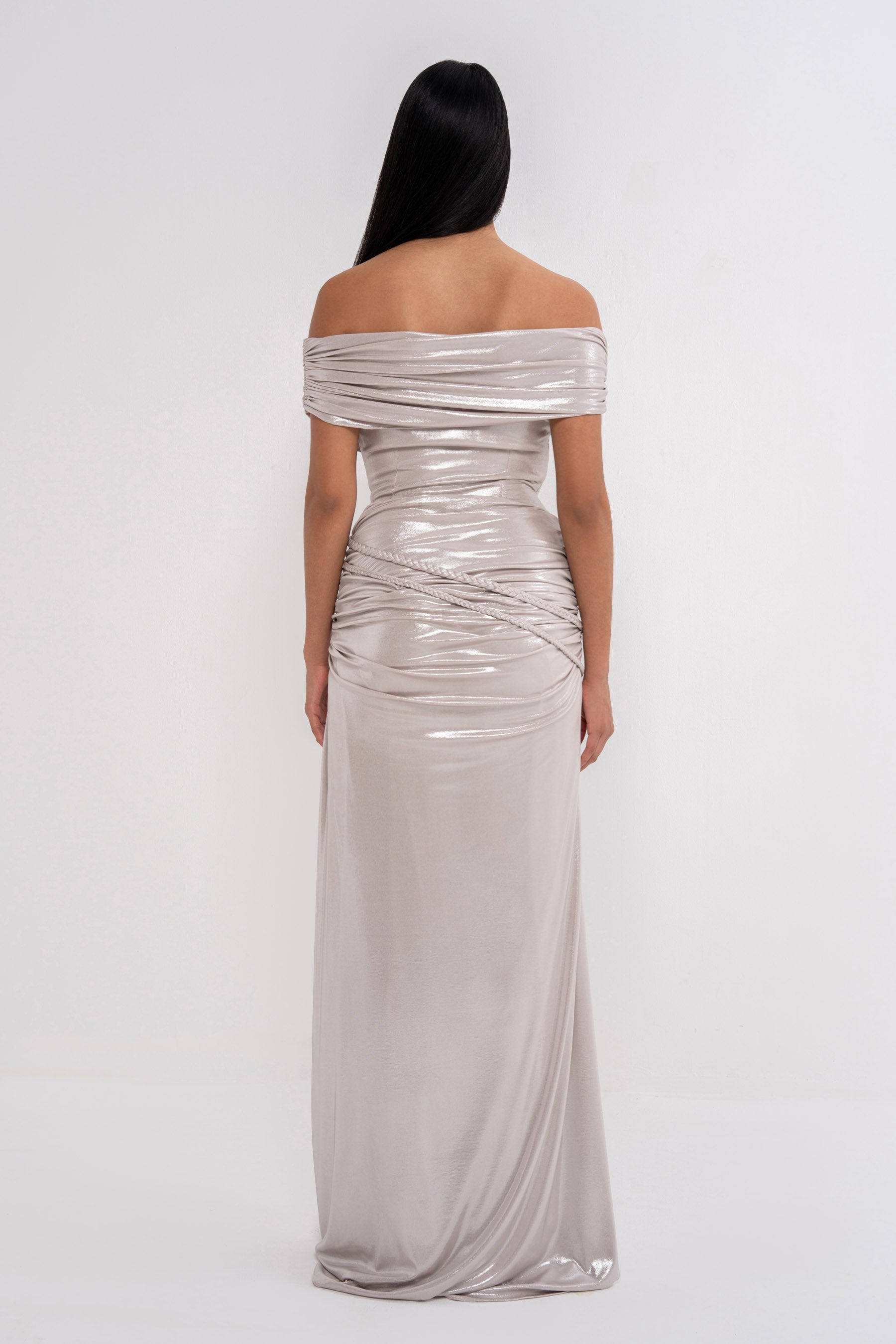 Manel-Fashion Electra dress shown on a model, featuring a stylish, fitted design in a vibrant fabric, perfect for casual or evening wear.