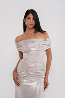 Manel-Fashion Electra dress in vibrant fabric, featuring a stylish design with elegant sleeves and a flattering fit.