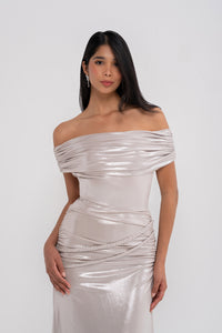 Manel-Fashion Electra dress in vibrant fabric, featuring a stylish design with elegant sleeves and a flattering fit.