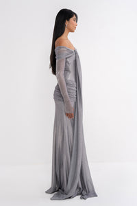 Manel-Fashion Urania dress featuring a stylish, flowy design in vibrant fabric, perfect for elegant occasions.