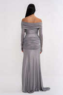 Urania dress by Manel-Fashion featuring a stylish, elegant design with a flowing fabric and intricate detailing.