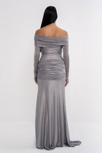Urania dress by Manel-Fashion featuring a stylish, elegant design with a flowing fabric and intricate detailing.