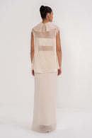 NOVA SET by MANEL-FASHION featuring stylish clothing pieces arranged on a plain background.
