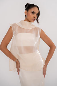 NOVA SET by MANEL-FASHION featuring stylish clothing pieces displayed on a hanger.